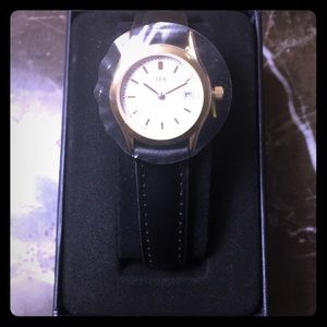 TFX by Bulova watch with black leather wristband